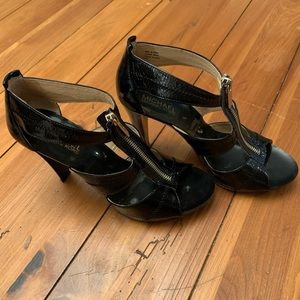 Black patent leather heel with t strap zipper